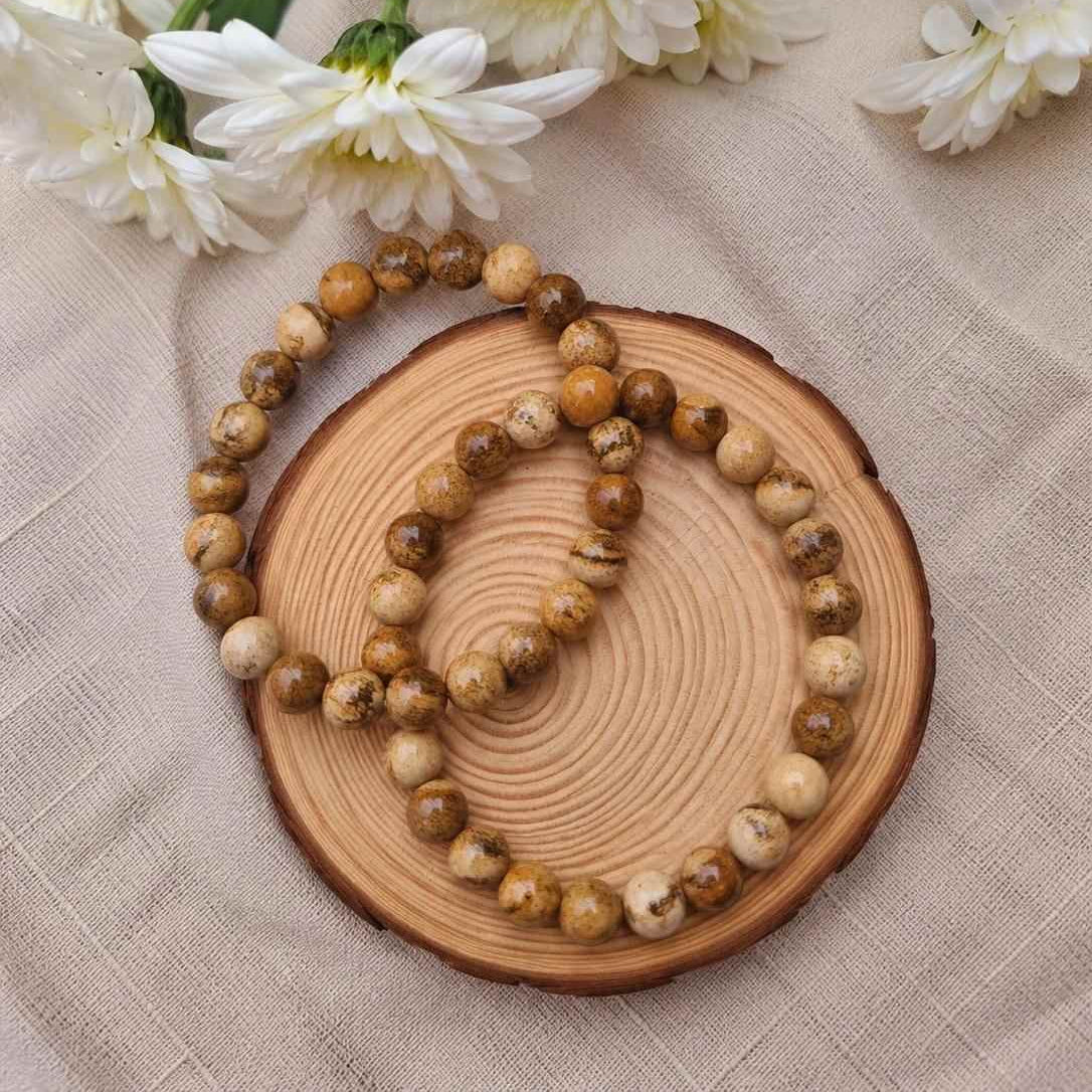 Pulsera de jaspe paisaje natural de 6 mm con piedras en tonos marrones, beige y tierra, con patrones únicos inspirados en paisajes naturales